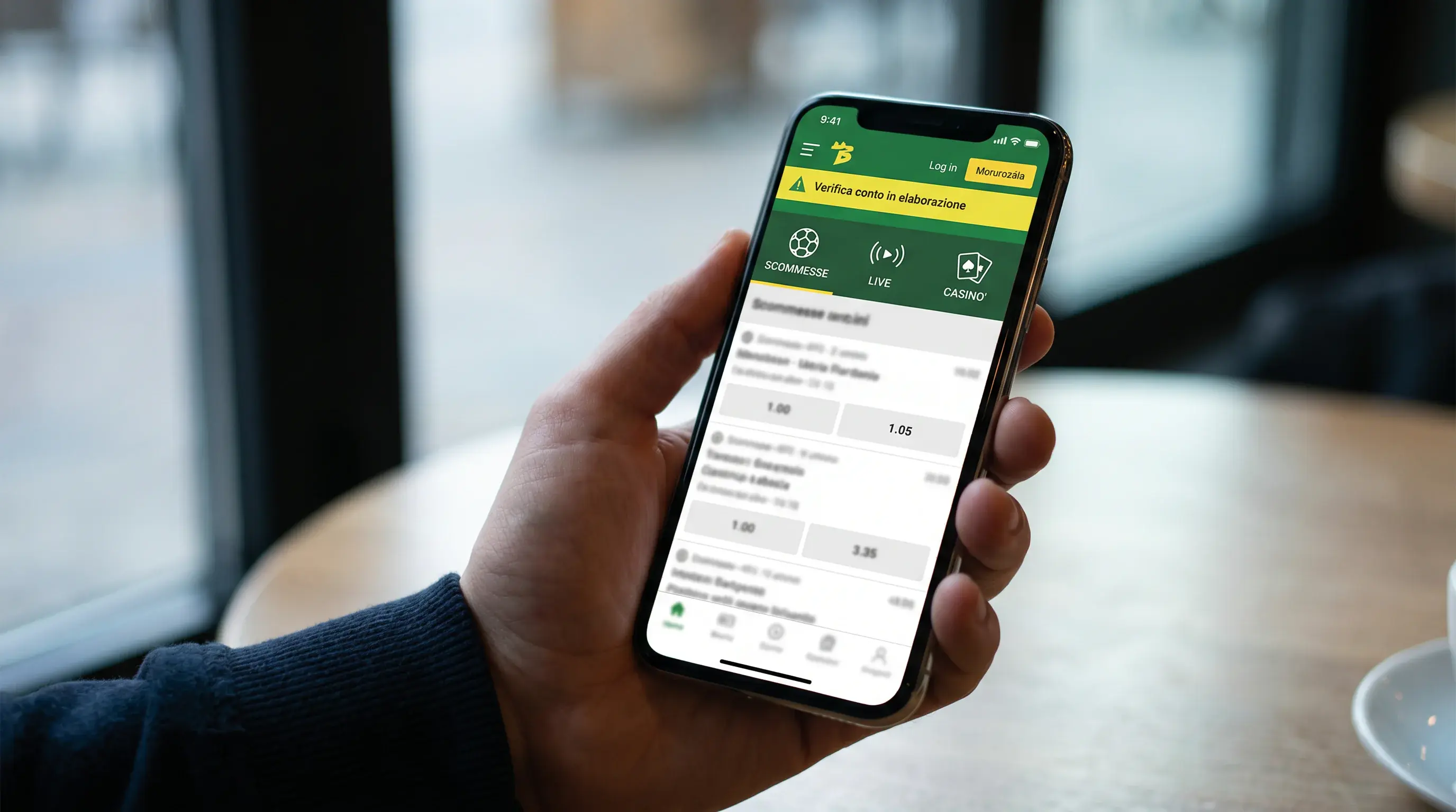 Schermata con notifica di stato di verifica del conto su un'app di scommesse